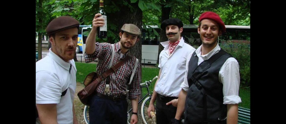 French people with their baguette, beret, wine and mustache