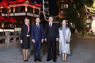 Xi and his wife meet French president and his wife in Shanghai