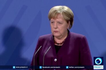 Merkel rejects French president's comments about NATO
