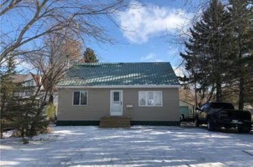 2 BR home in Shoal Lake with large backyard.