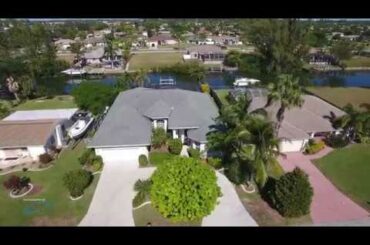 IMMACULATE GULF ACCESS POOL HOME ON OVERSIZED LOT