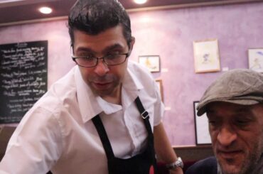 Trying traditional French food in Paris, France. Le hachis Parmentier & le Beaujolais Nouveau.