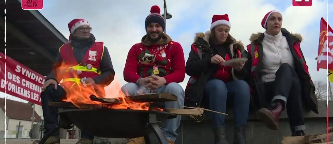 French strikers organise Christmas picnic in front of train station