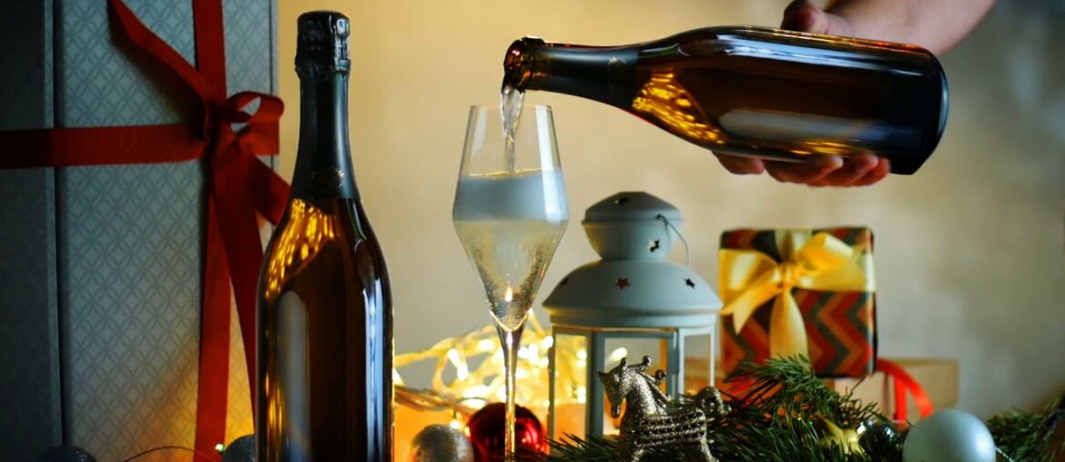 champagne flute with sparkling wine pouring champagne into the glass seamless cinemagrap