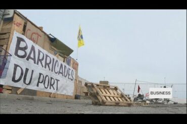 French unions blockade ports as strikes drag on
