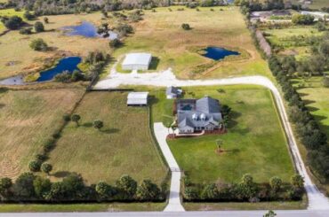 671 LEMON BLUFF ROAD, OSTEEN, FL Presented by Anna Snyder.