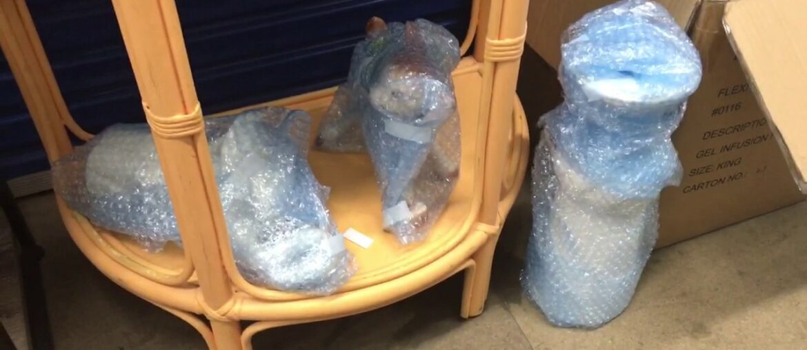 Abandoned Storage Unit of Rustic French Provincial Dining Table wall prints DVD etc at Newcomb Vic