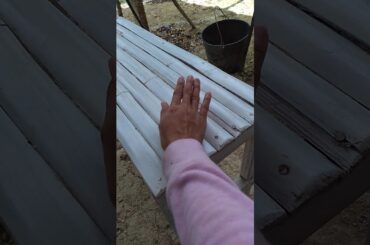 Cooking lunch in the farm while husband is busy.