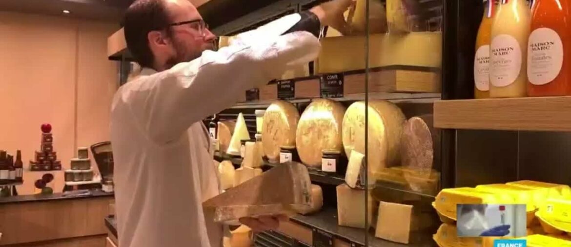 Some bread and wine with that? Paris cheesemonger adapts to stay afloat during France's lockdown