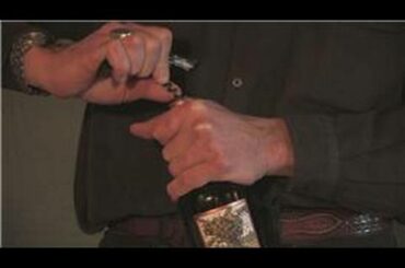 Wine Advice : How to Open a Wine Bottle With a Corkscrew