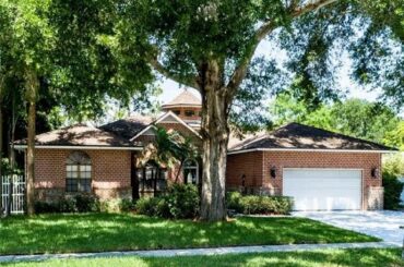 Homes for sale - 1056 WEATHERSFIELD DR, DUNEDIN, FL 34698