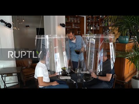 Could these Plexiglass shields become future of post-COVID dining? Could these Plexiglass shields become future of post-COVID dining?