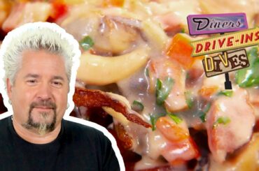 Guy Fieri Dives Into Seafood CHOWDER-Topped French FRIES | Diners, Drive-Ins and Dives