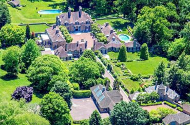 Timeless French Normandy Manor Home Looks Like a Medieval European Village