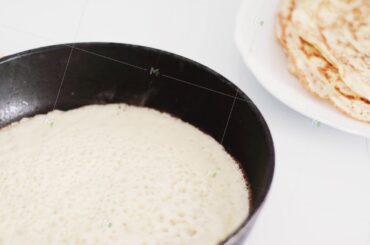 Traditional french crepe recipe on frying pan, homemade thin pancakes for breakfast, food