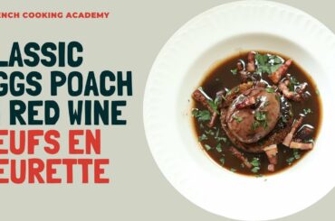 Oeufs en meurette: the famous eggs poached in red wine served with burgundy red wine sauce.