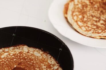 Traditional french crepe recipe on frying pan, homemade thin pancakes for breakfast, food