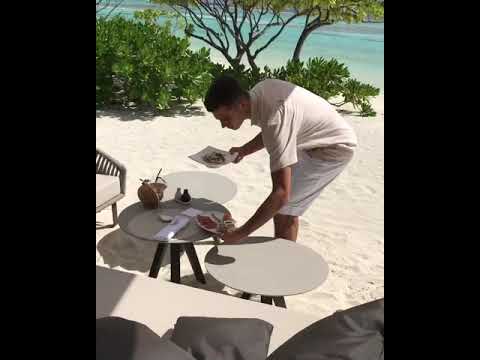 Fine dining lunch on the private beach in The Brando. Fine dining lunch on the private beach in The Brando.