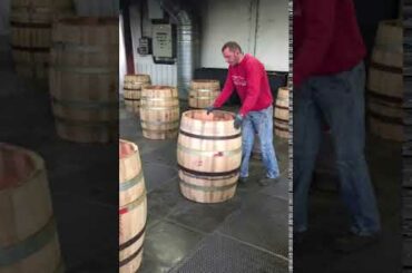 Toasting wine barrels at Tonnellerie Cadus, Burgundy, France.