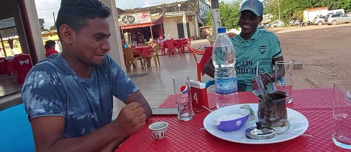 Drinking Tea/Coffee in African Restaurant (Ivory Coast)