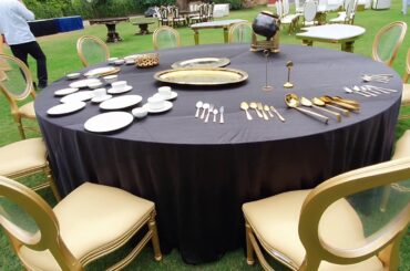 Round Table with linen & Golden French Chair avaialble on rentals at GRAND Suppliers & Facilitators.