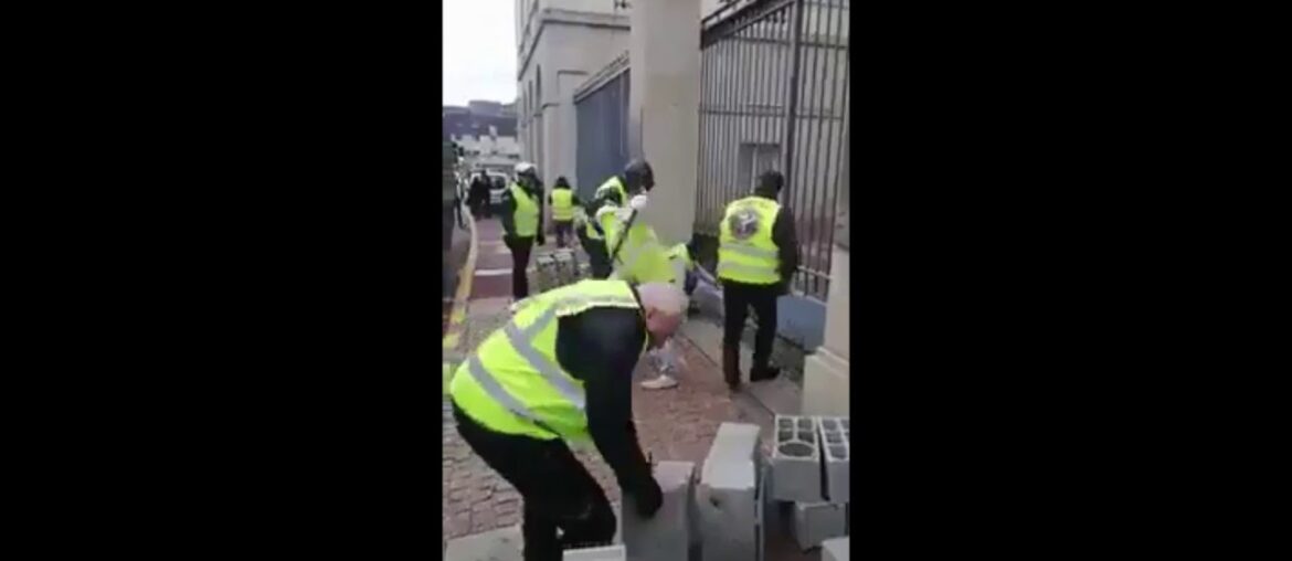 French Protesters Brick Up Parliament Gates!!!