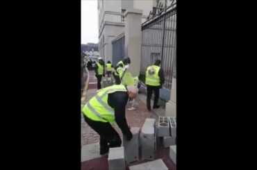 French Protesters Brick Up Parliament Gates!!!
