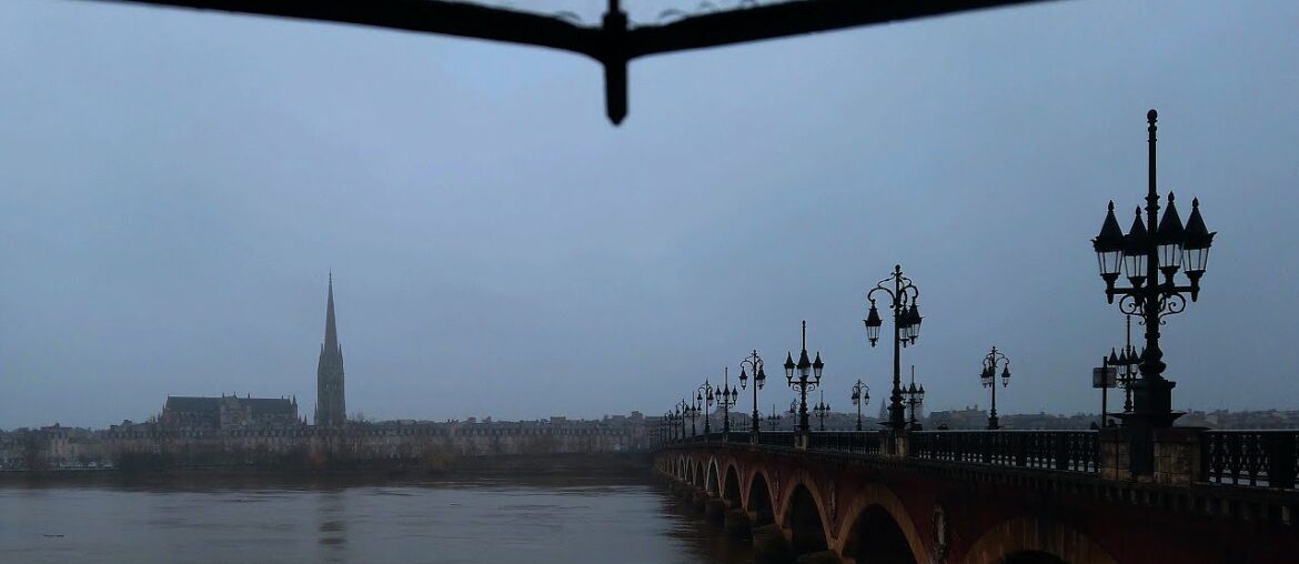 Walking on the rainy old stone bridge, transparent umbrella, Bordeaux, France 4K / DEC 21 2020 Walking on the rainy old stone bridge, transparent umbrella, Bordeaux, France 4K / DEC 21 2020