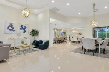 16049 Delarosa LN, NAPLES, FL Presented by Adrian Sabatino.