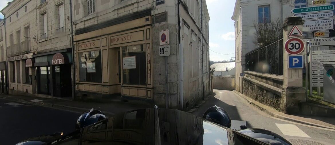 Driving a Classic Car through a small French Town Driving a Classic Car through a small French Town