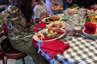 Family eating dinner at French restaurant call salut