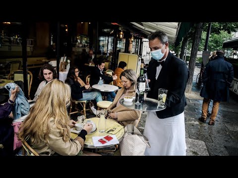 Grand day for the French: Cafe and bistro terraces reopen Grand day for the French: Cafe and bistro terraces reopen
