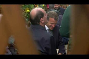 France's Macron drinks coffee at terrace as French bars and restaurants reopen