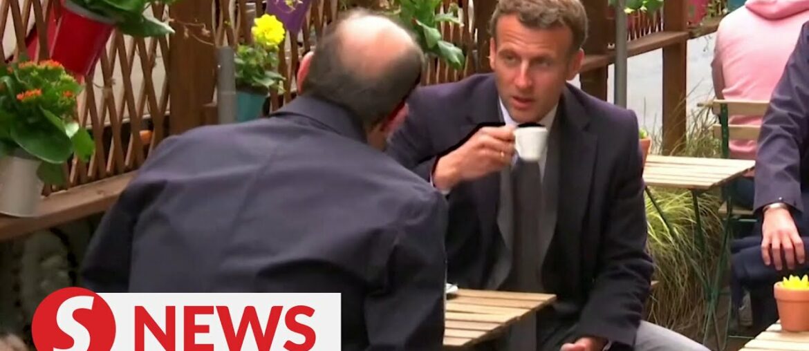 France's Macron out in the cafe after Covid-19 restrictions are eased France's Macron out in the cafe after Covid-19 restrictions are eased