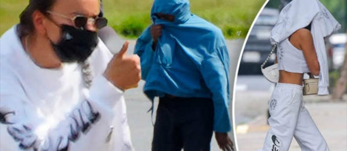 Irina Shayk gives a thumbs up as she touches down with Kanye West in New Jersey on a private plane..