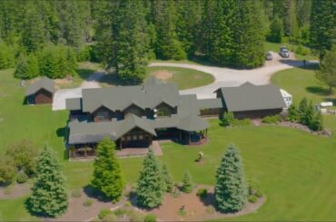 Large home on 107 acres with 10 acre pond and snow creek