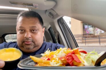 Eating Taco Bell Loaded Taco Fries & Burrito