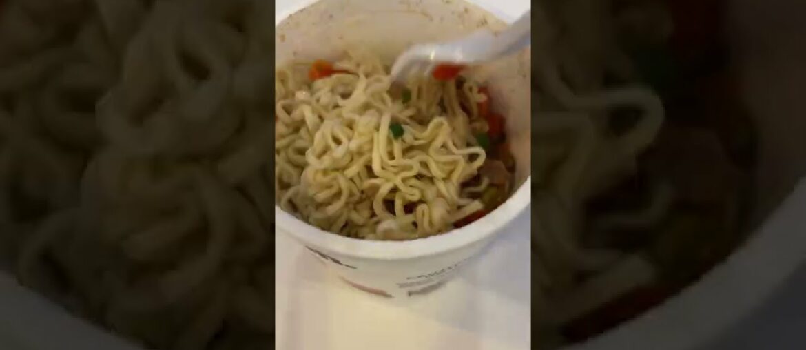 Eating instant ramen at a hotel