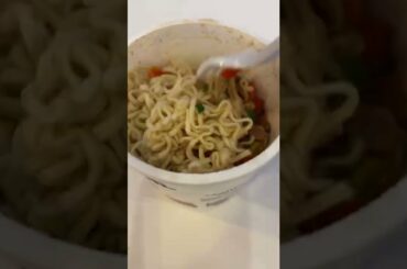 Eating instant ramen at a hotel