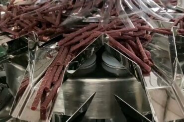 Long strip food packaging machine with multihead weigher