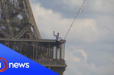 French daredevil stuns crowd with Eiffel Tower highwire act
