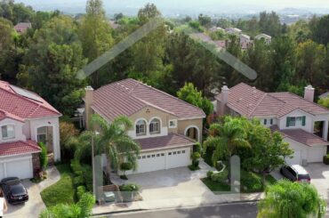 5+4 Full Baths + Loft on a Cul-De-Sac w/a 3 Car Garage, Bed & Bath Downstairs, & Remodeled Kitchen!