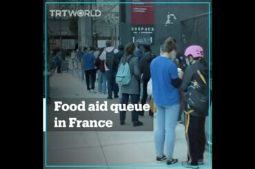 French students wait in long lines to receive food aid