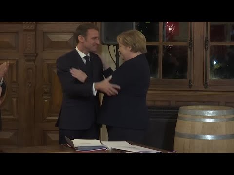 French President Emmanuel Macron raises final toast to Angela Merkel French President Emmanuel Macron raises final toast to Angela Merkel