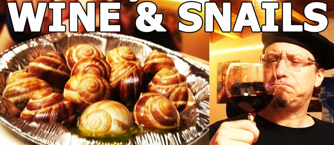 Man of Culture drinks Wine and eats delicious Escargots (SNAILS) Man of Culture drinks Wine and eats delicious Escargots (SNAILS)