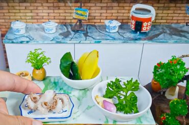 The Best Pan fried octopus served with fried spinach and french fries / Miniature Food