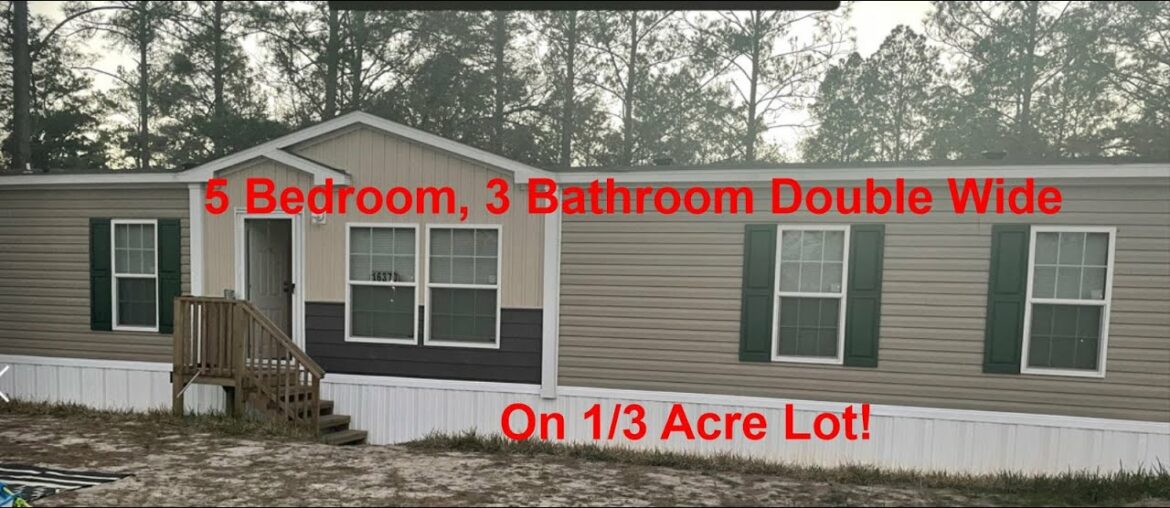 LIKE NEW 2021 Family Sized Double Wide Manufactured Home 5/3 on 1/3 acre in quiet Fort McCoy FL!