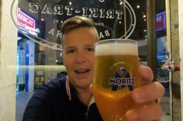 Eating Patatas Bravas Gourmet (spicy fried potatoes) & Morcilla (Blood Sausage) in Barcelona.