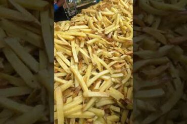 Mountain of French Fries, Chips, Fried Potatoes. London Street Food