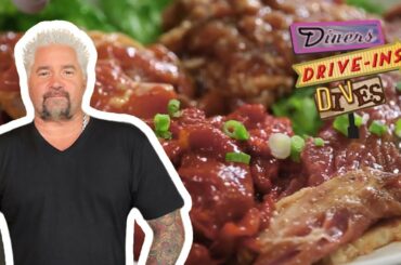 Guy Fieri Eats All-You-Can-Eat Korean BBQ | Diners, Drive-Ins and Dives | Food Network